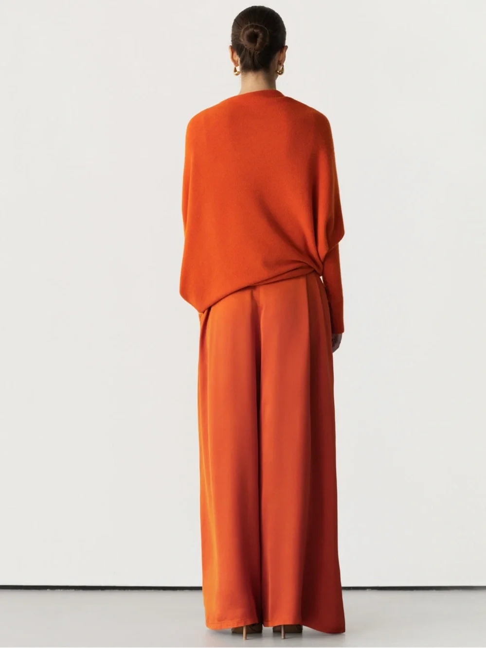 Jaki Lindon Asymmetric Draped Orange Seamless Knit